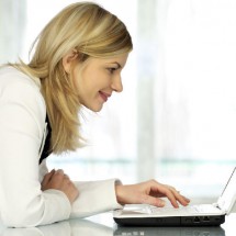 Woman with laptop.